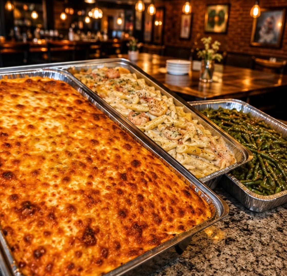 Nzuri Reyne catering trays of baked mac and cheese pasta and green beans