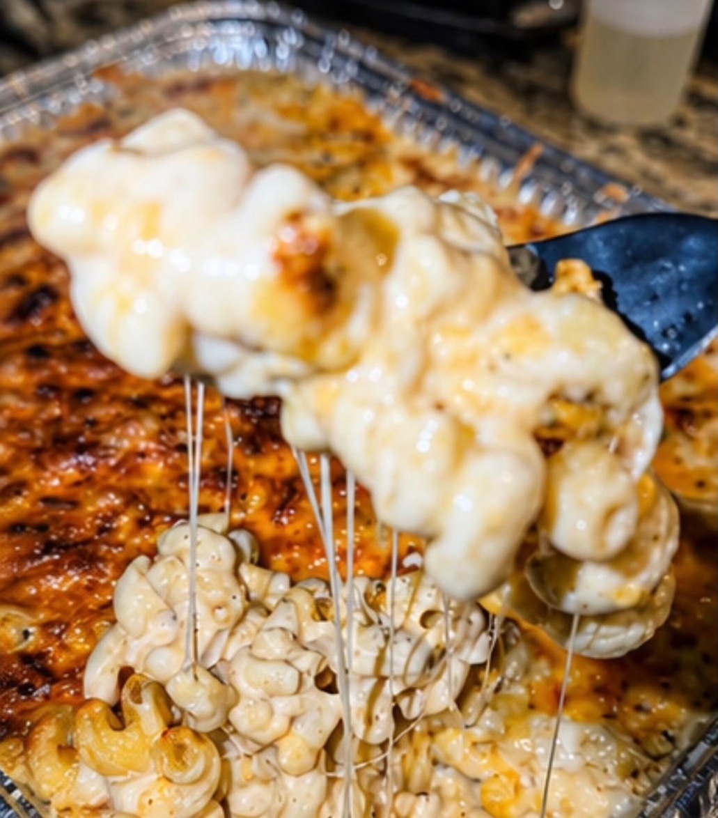 Nzuri Reyne catering baked mac and cheese cheese pull Houston